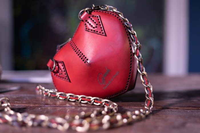Grosh textured leather mini crossbody bag with chain