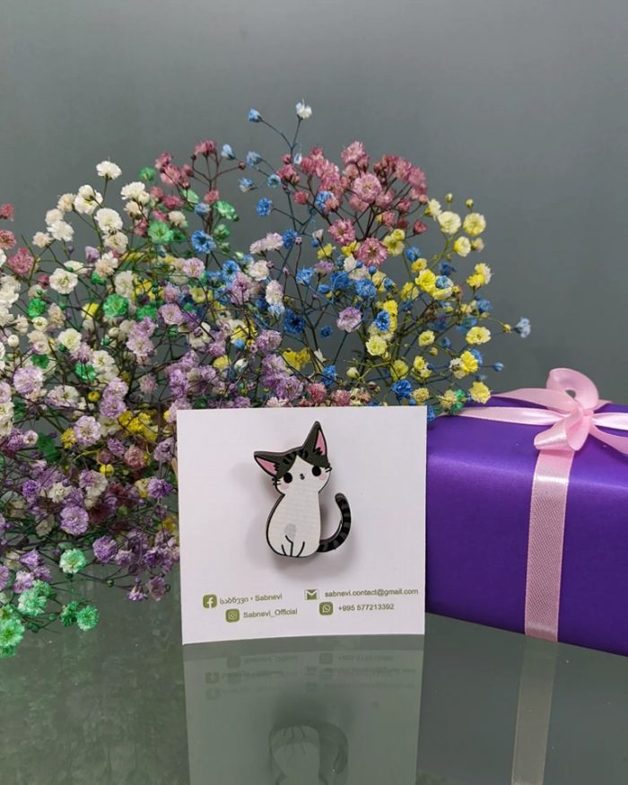 333669638_5831873083514709_3655037319360217448_n.jpg Curious Black & White Kitten Wearable Pin from Sabnevi