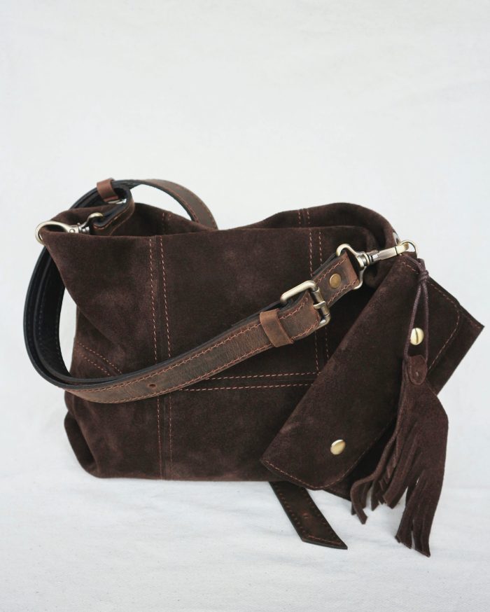 Handmade suede crossbody bag with adjustable strap